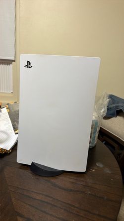 Ps5, Purple Controller, PS Pulse Elite Wireless Head set, and Sony Dual controller charging port.