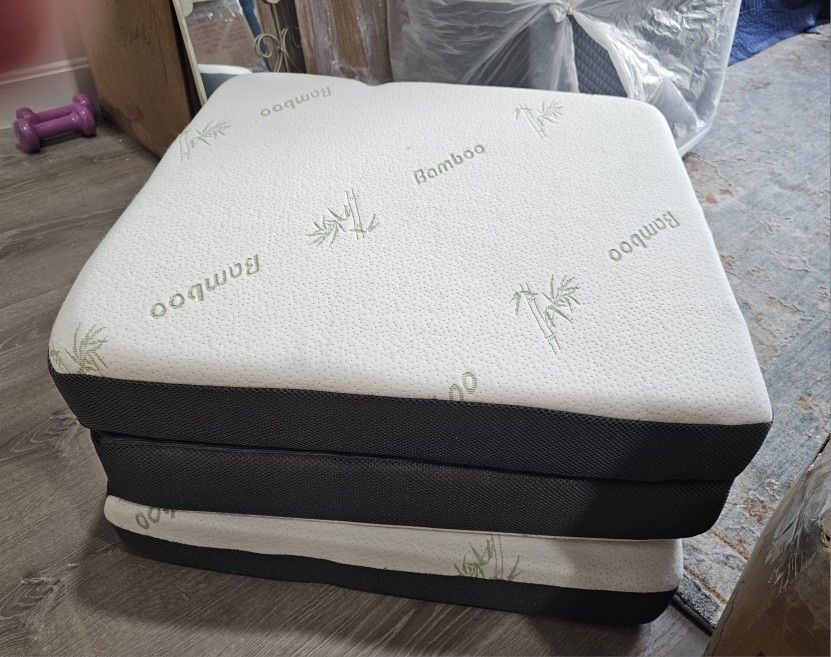 2 brand new, never used Tri-fold memory foam mattress, seat.