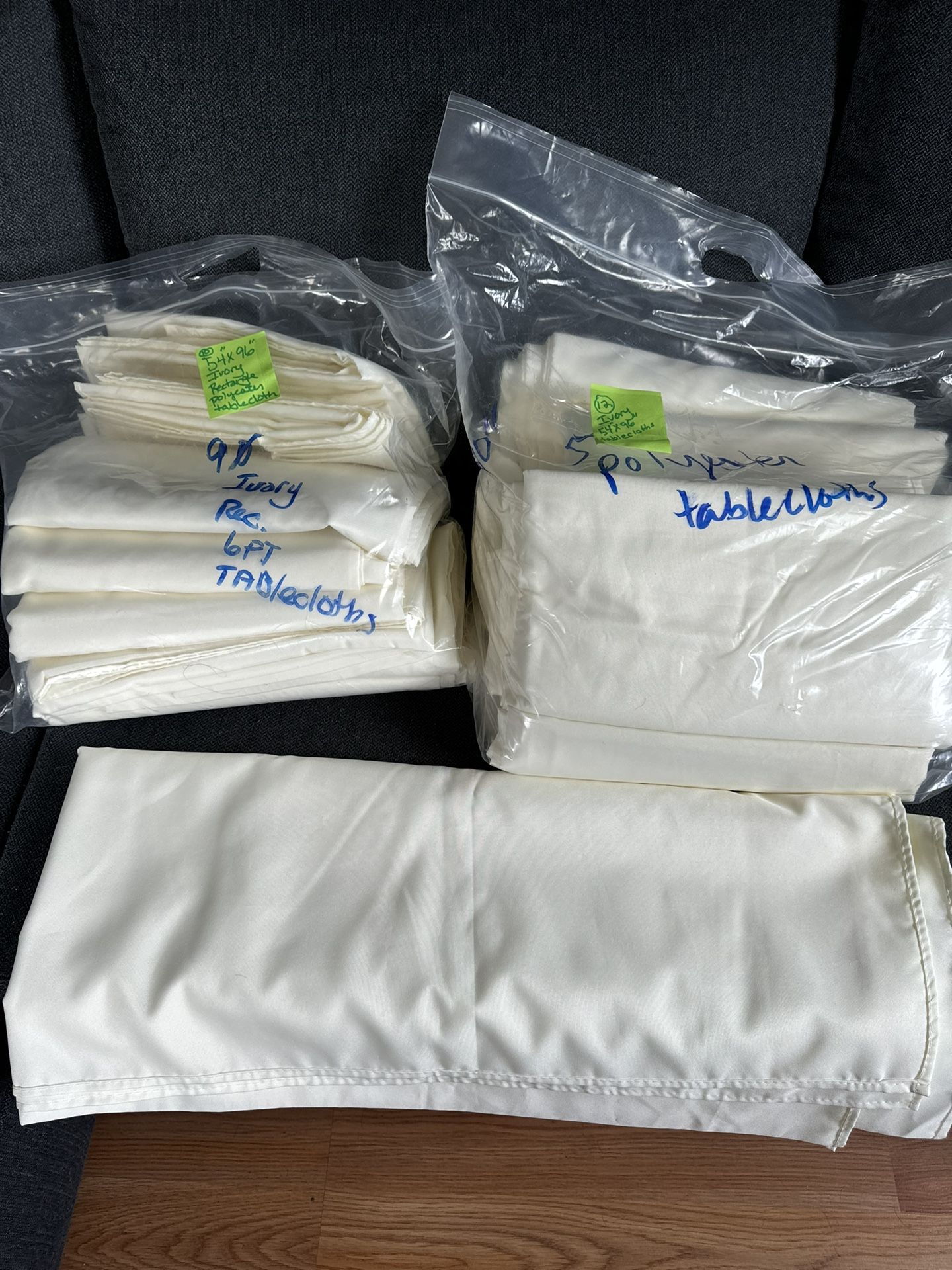 54’x96” Ivory Polyester Tablecloths