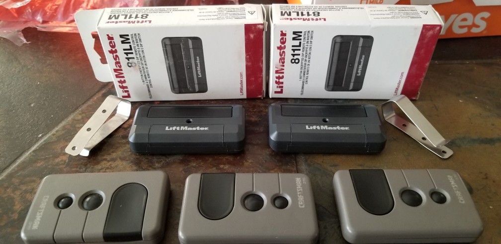 Garage Door Remote. 2 Chamberlain & 3 Craftman