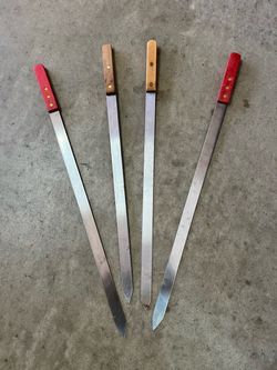 Skewer Stainless Steel with Wood Handle 25" X1" wide.
