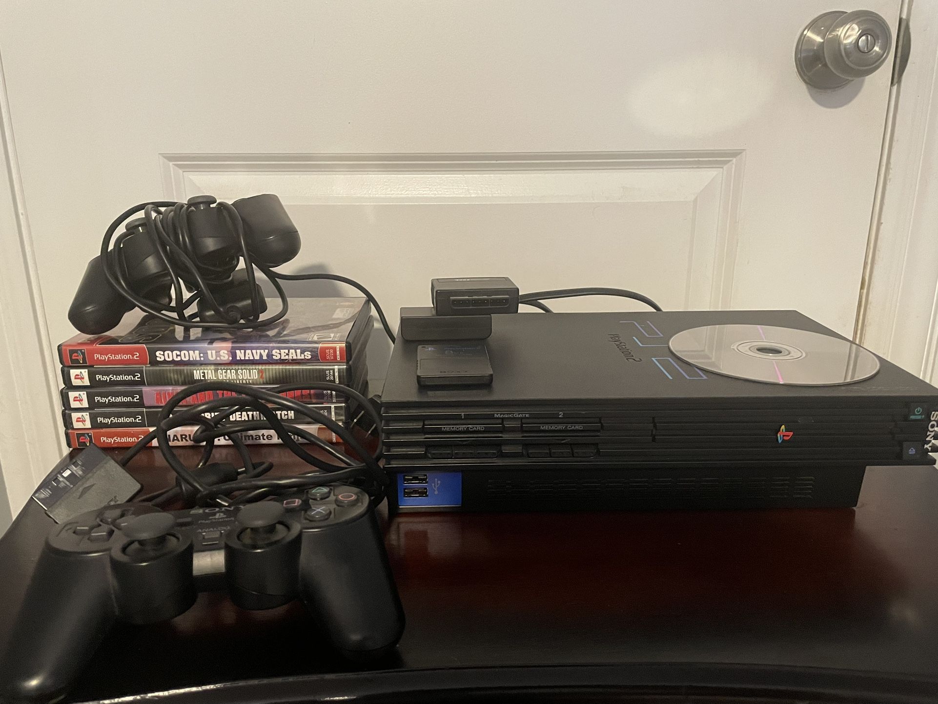 PlayStation 2 System With 6 Games