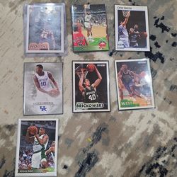 7 Basketball cards (with case and sleeves. See descripstion)