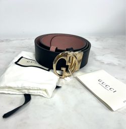 Gucci reversible belt — black & pink — used — excellent condition