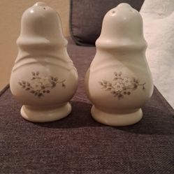 Salt And Pepper Shackers And Gravy Boat