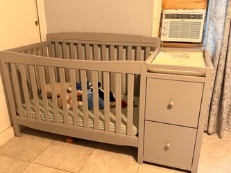 Crib with changing table