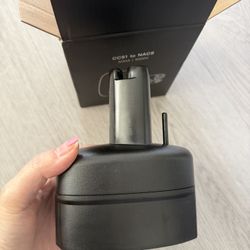 CCS1 to NACS adapter for electric vehicle charging.