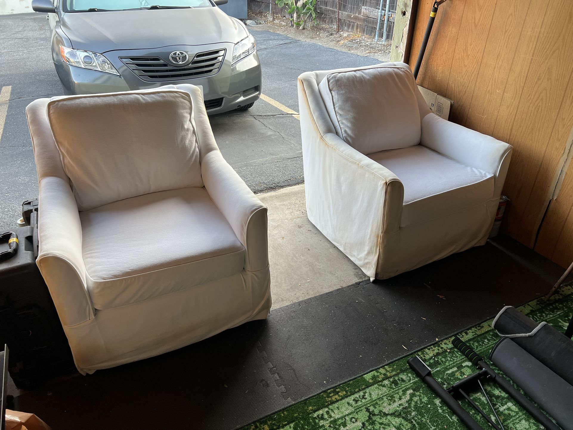 Two Bella Swivel Armchairs