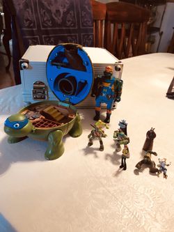 TMNT Items, 1994 Mighty Mutations Construction, and 2.5’ inch figures with a secret station? I don’t know if they belong together or not.
