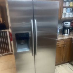 Modern Stainless Steel Refrigerator, Stove And Microwave 