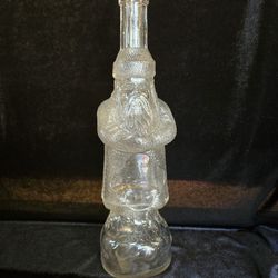 Antique  M.G. Husted glass Santa Bottle. 