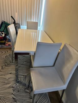 white table and chairs