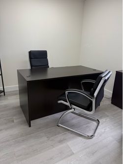 Office desk with chairs