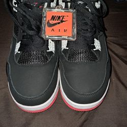 JORDAN SIZE 13 4S BLACK AND RED