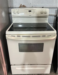 Glass top beige electric stove , estufa de color beige