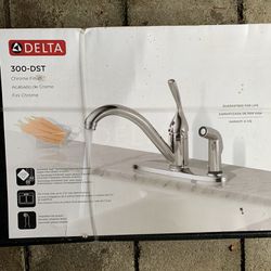 Kitchen faucet <DELTA> with side spray.              Model: 300DST,    New, never open box.                           