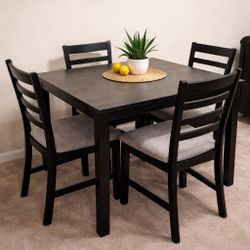 4-Person Dining Table Set – Dark Wood w/ Gray Cushioned Chairs 