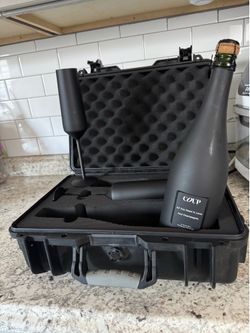 champagne bottle with 2 cups