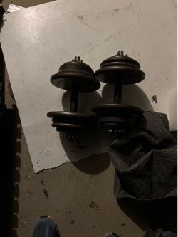 Dumbbells adjustable standard size 1”. 90 pounds,bars and collars.