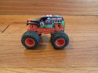 Hot Wheels Monster Jam Truck Grave Digger Orange Frame Diecast 1:64