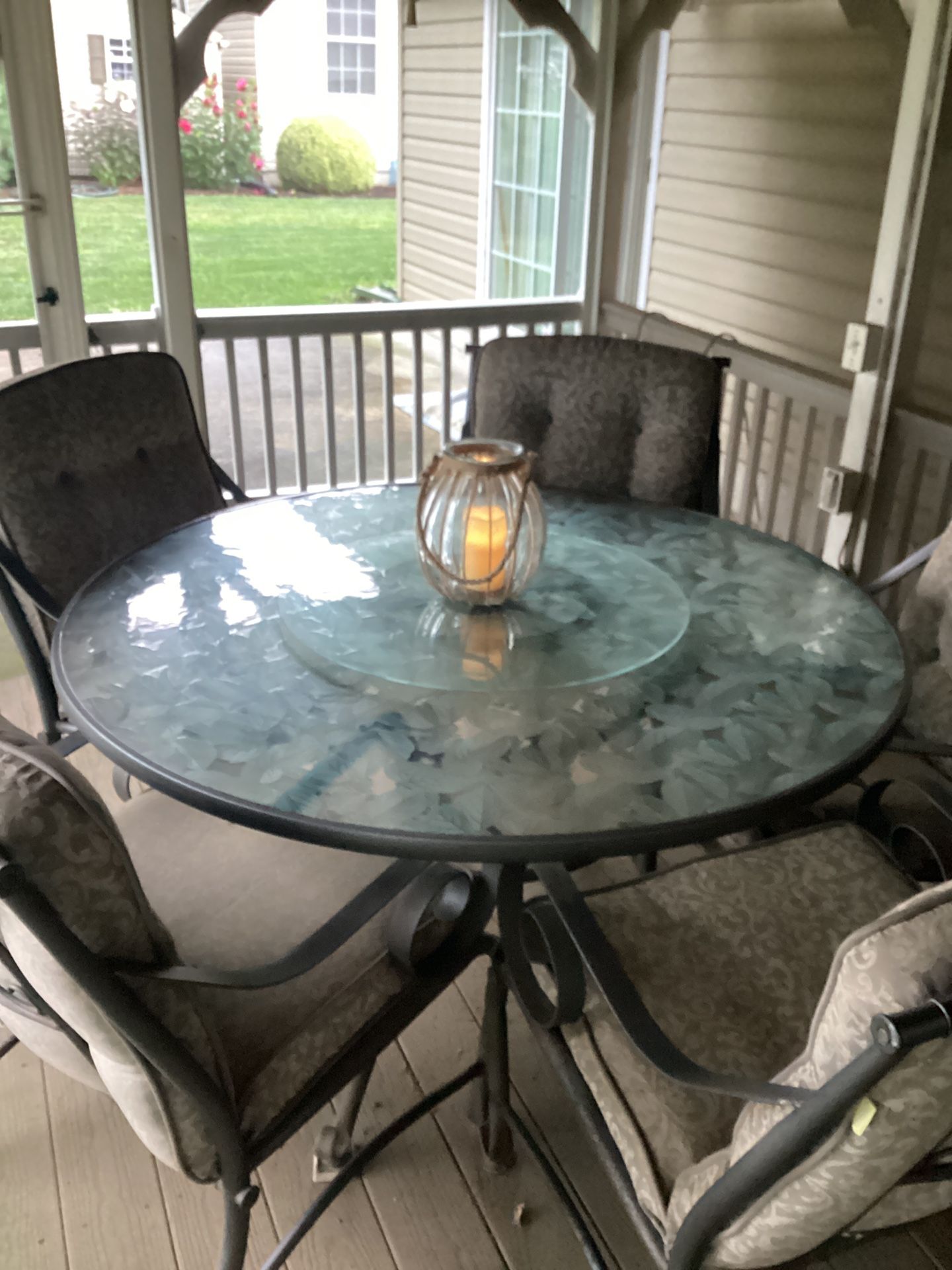 6 Peice Etched Glass Lazy Susan Neutral Thick Cushion Wrought Iron Chair Patio Set