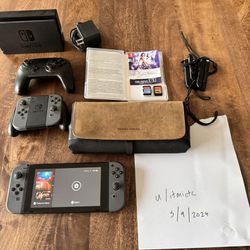 Nintendo Switch, Accessories, And 2 Games