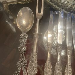 set of sterling silver plated designer silverware. 