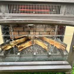 Duraflame  Fireplace Stove Heater Heats 1,000 Sq Ft Room Infrared Heat Maintains Humidity Prevents Dryness Realistic 3 D Glowing Log Embers Effect 