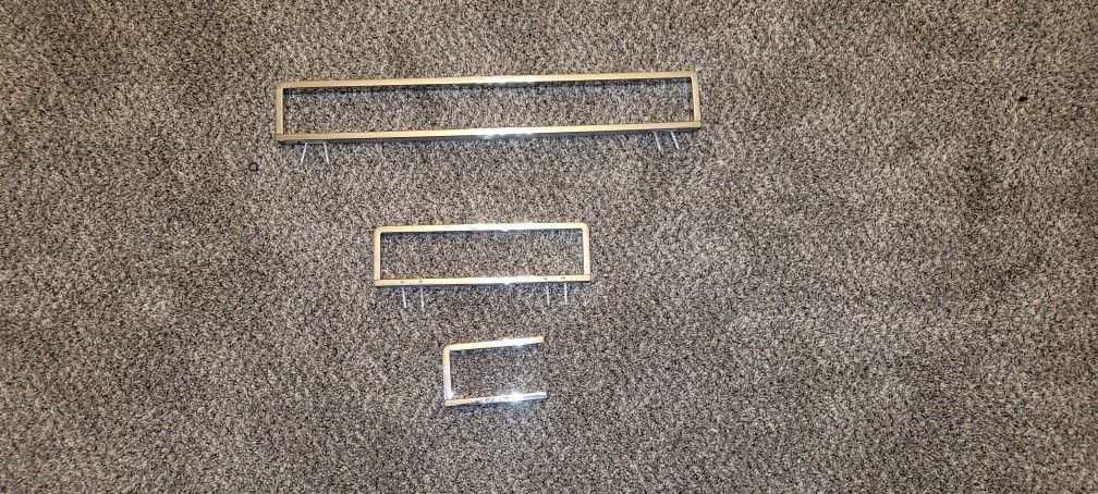 Two Towel Racks, One Toilet Paper Holder