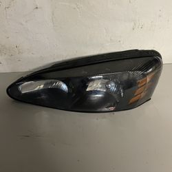 PONTIAC GRAND PRIX DRIVER HEADLIGHT ASSEMBLY