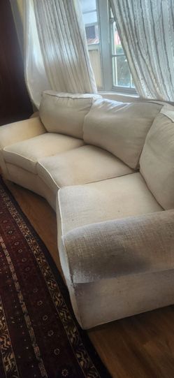 8 foot curved backed Cream Fabric " feather like"  three Seater Sofa