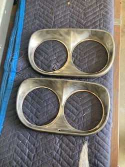 Headlight doors off a 1959 Ford pick up.
