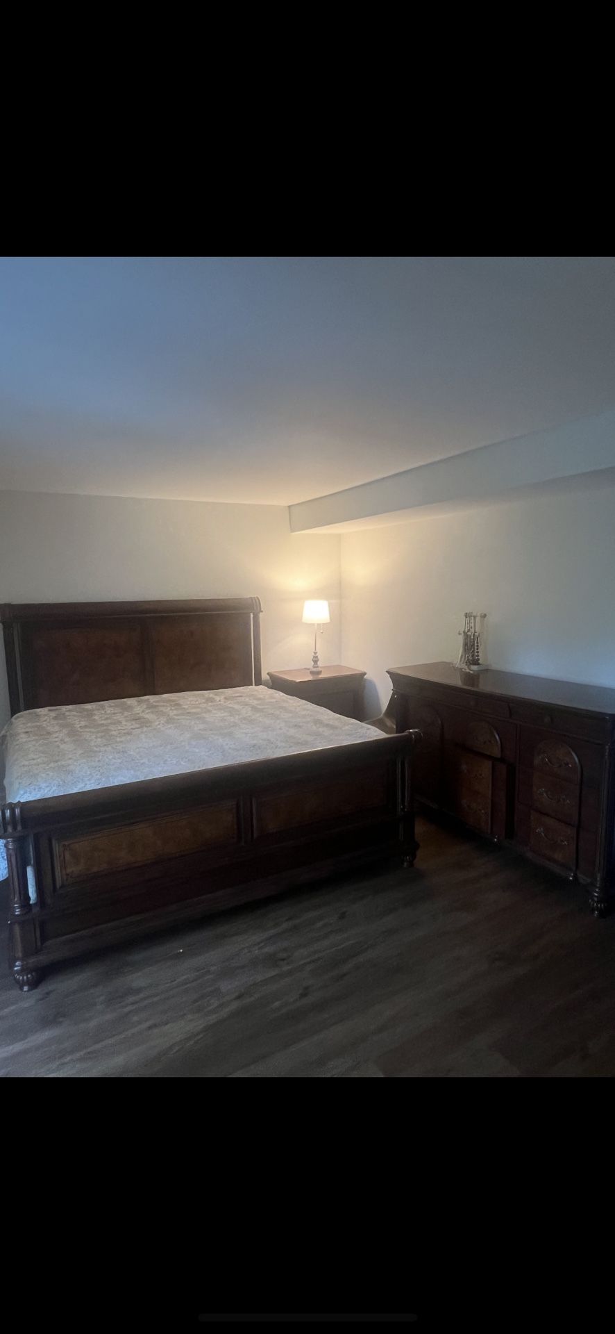 Wooden bed frame and dresser set. 