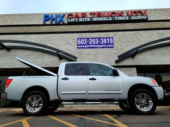 Nissan Titan armada wheels tires suspensions (we Finance)