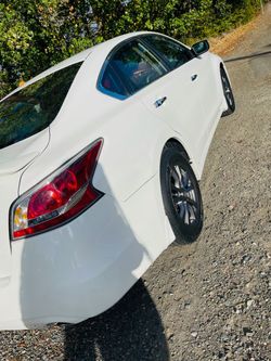 2016 White Nissan Altima Sedan Sport
