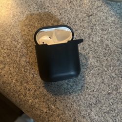 left airpod + case