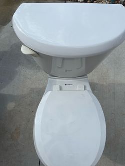 Toilet in good condition; works well. It measures 16 inches in height.