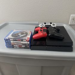 PS4 With Controllers & Games