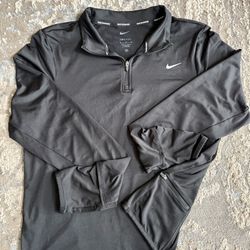Women’s Nike Dri-FIT 1/4 Zip Running pullover in Black Size Medium
