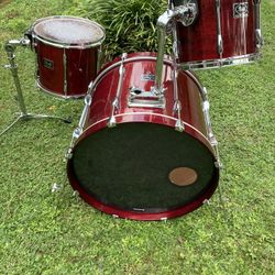 Pearl Export Select Drum Set. Beautiful Burgundy finish, wood bass drum hoops, ISS mounts, Uni Lock tom arms and stand for floor tom. 22” kick drum, 1