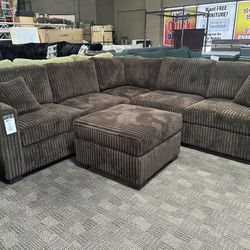 Super Soft Brown Sectional And Ottoman 