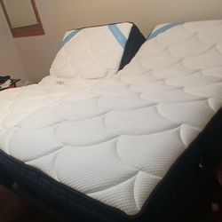 "Like New" Adjustable Bed frame and mattresses 
