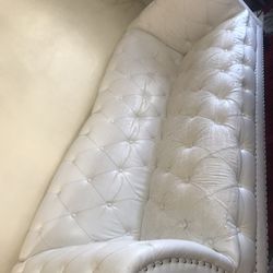 Three White Sofa’s 