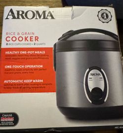 Aroma Rice and grain cooker new never used asking 25 don’t need