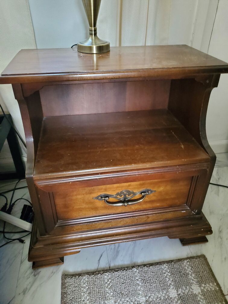 Two different wooden side tables or nightstands