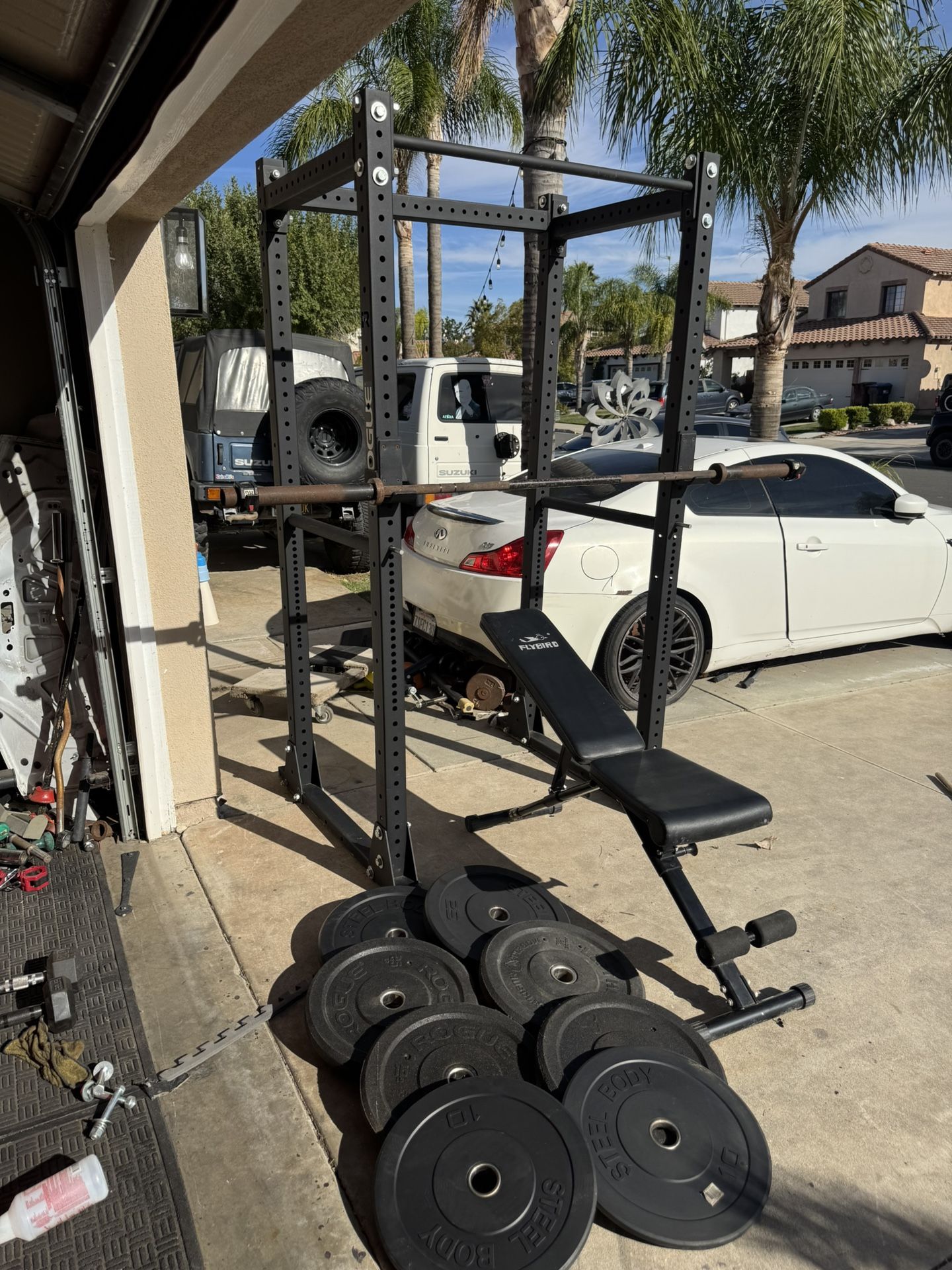 RML-390F FLAT FOOT MONSTER LITE RACK plus 7ft 45lbs rogue Ohio bar and 170bs of bumper weights