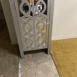 Armoire Silver Cabinet With Matching Vase