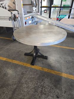 Round Hammered Metal Pedestal Dining Table