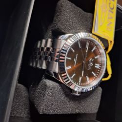 Brand  New Invicta Watch  Fluted  Bezel Jubilee type band, all wrapped in plastic  with box .