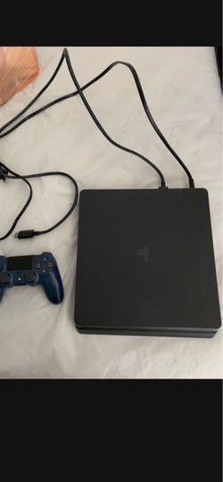 PS4 Slim 1TB plus 3 games